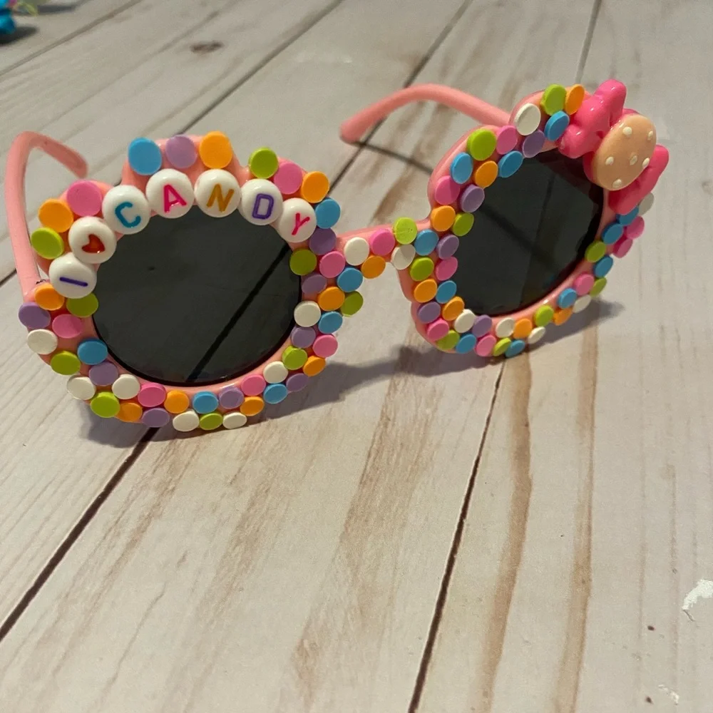 Girls pink flower shaped sunglasses w candy